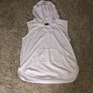 Very light pink sleeveless hoodie